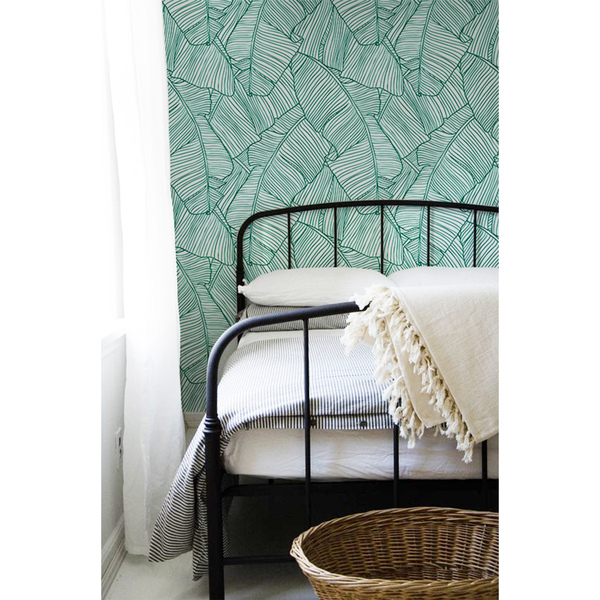 Fotobehang In de schaduw van exotische turquoise bladeren