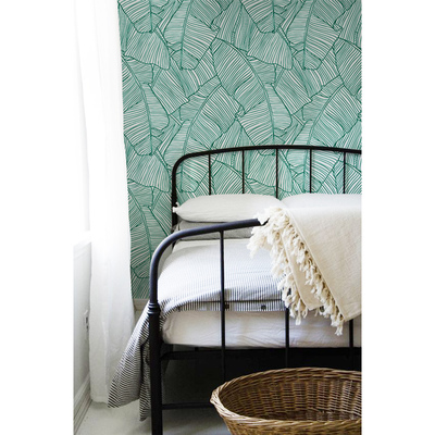 Fotobehang In de schaduw van exotische turquoise bladeren