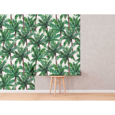 Fotobehang Rust uit onder de groene palmbomen