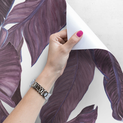 Fotobehang Rusten in de schaduw van bananenbladeren