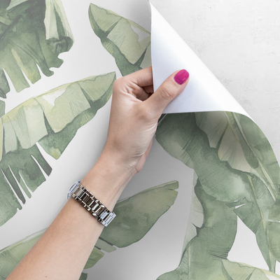 Fotobehang Een moment van rust in de schaduw van een bananenboom