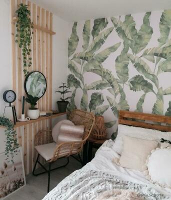 Fotobehang Een moment van rust in de schaduw van een bananenboom