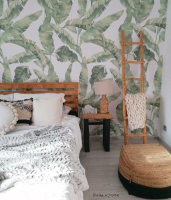 Fotobehang Een moment van rust in de schaduw van een bananenboom