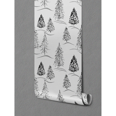 Fotobehang Kerstbomen in een groen bos