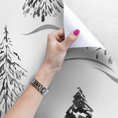 Fotobehang Kerstbomen in een groen bos