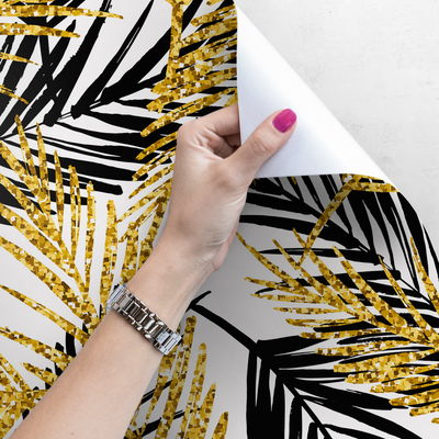 Fotobehang Tropische bladeren badend in goud