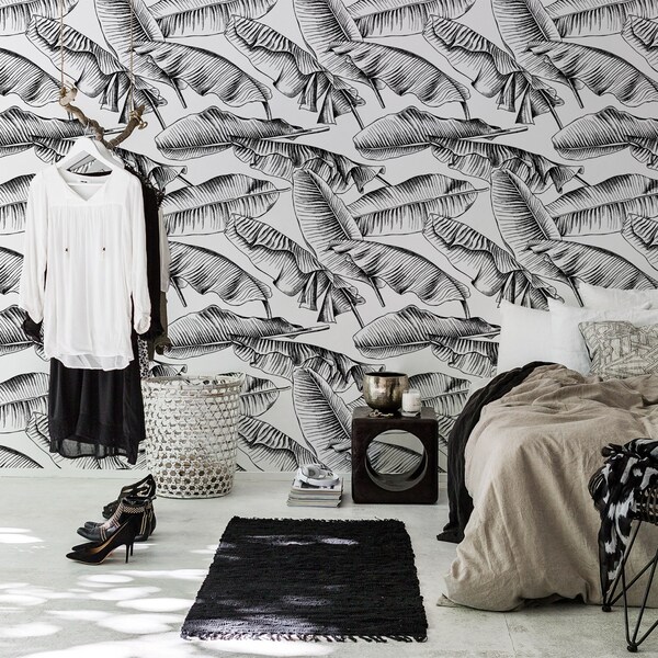 Fotobehang Zwarte bladeren in de wind