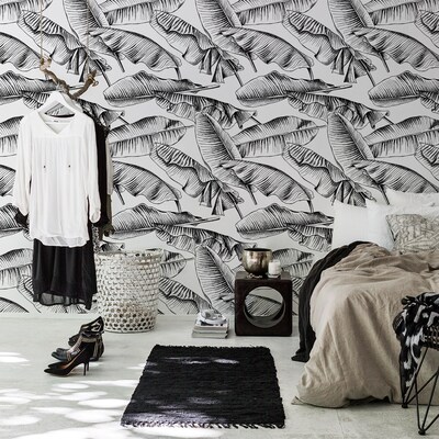 Fotobehang Zwarte bladeren in de wind