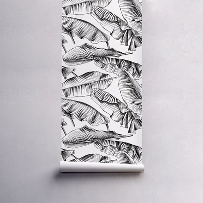 Fotobehang Zwarte bladeren in de wind