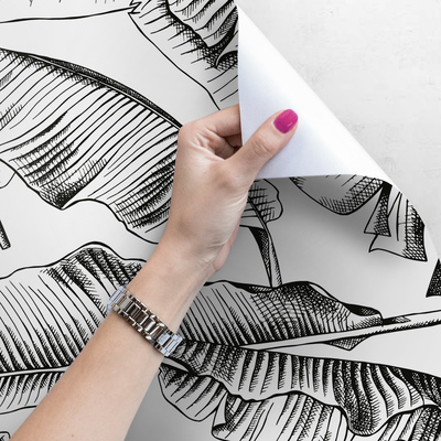 Fotobehang Zwarte bladeren in de wind