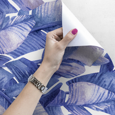 Fotobehang Azuurblauwe bananenbladeren