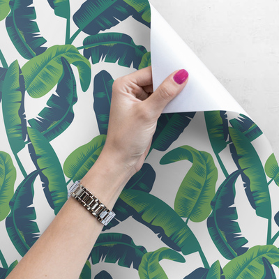 Fotobehang In de schaduw van bananenbladeren