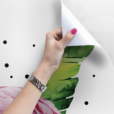 Fotobehang Flamingo's in bananenbladeren