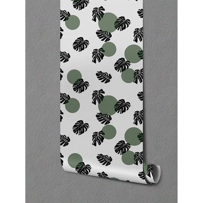 Fotobehang Monstera en groene wielen