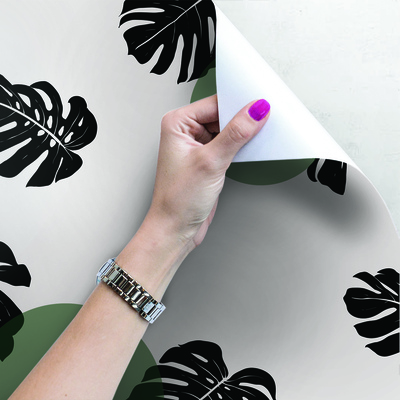 Fotobehang Monstera en groene wielen