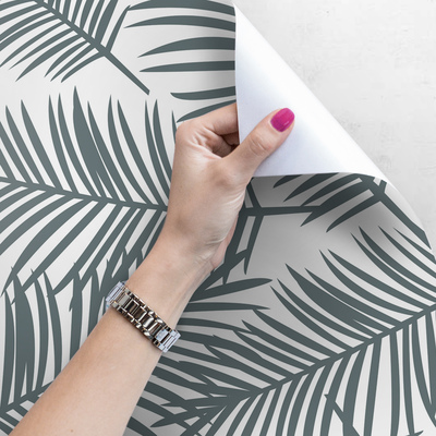 Fotobehang Een vleugje wind in de palmbladeren