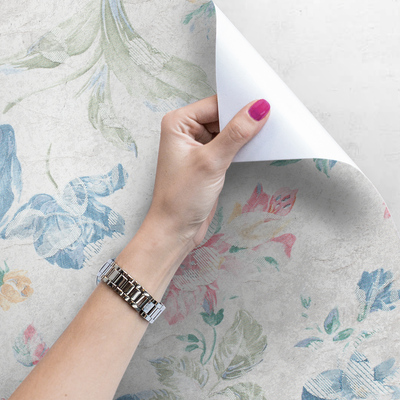 Fotobehang Ontspannen in een tuin vol bloemen