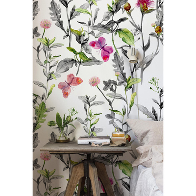 Fotobehang Een weide vol vlinders en bloemen