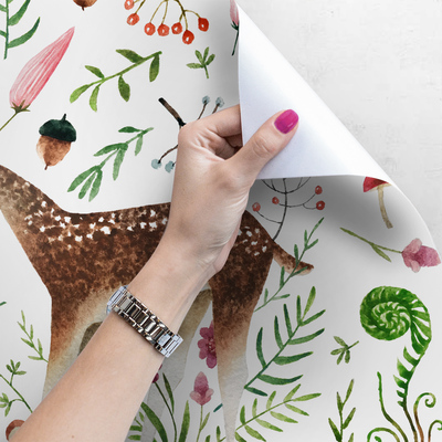 Fotobehang Herten in de weide