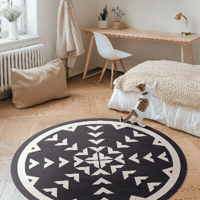 Pvc mat rond Wit pijlenpatroon op een donkere achtergrond