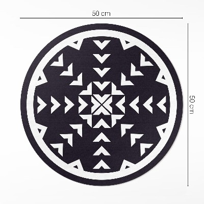 Pvc mat rond Wit pijlenpatroon op een donkere achtergrond