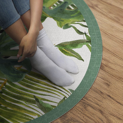 Rond pvc tapijt Groene plantenbladeren