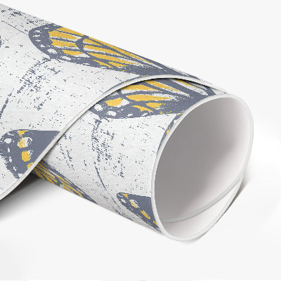 Rond pvc tapijt Gele vlinders op textuur