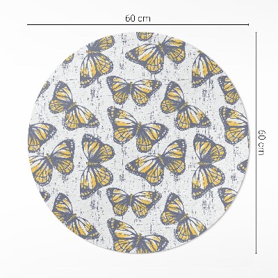 Rond pvc tapijt Gele vlinders op textuur