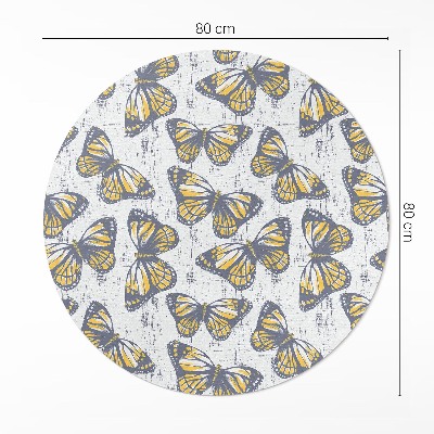 Rond pvc tapijt Gele vlinders op textuur
