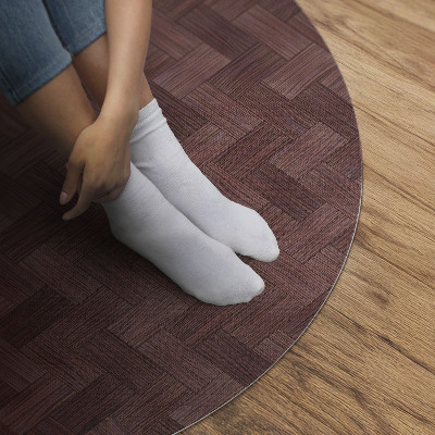 Rond pvc tapijt Geweven parketvloer in een modieus visgraatmotief