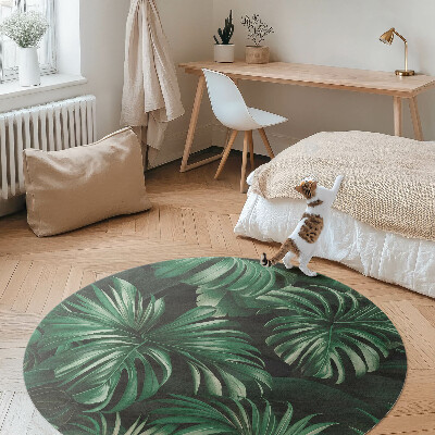 Rond pvc tapijt Tropische jungle monstera bladeren