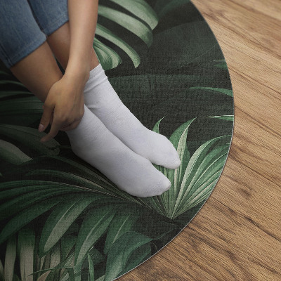 Rond pvc tapijt Tropische jungle monstera bladeren