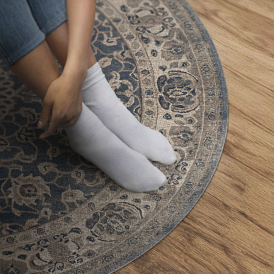 Vinyl vloerkleed rond Een aardse compositie in Perzische stijl