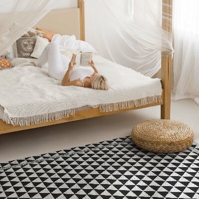 Vinyl tapijt Imitatiestof met zwart-witte driehoeken