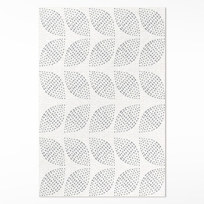 Vinyl vloerkleed Een compositie van donkere bladeren met stippen