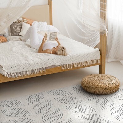 Vinyl vloerkleed Een compositie van donkere bladeren met stippen