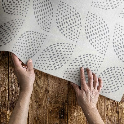 Vinyl vloerkleed Een compositie van donkere bladeren met stippen