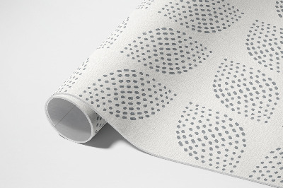 Vinyl vloerkleed Een compositie van donkere bladeren met stippen