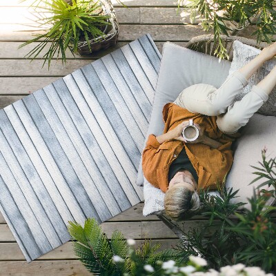 Buiten tapijt Grijze lichte houten vloerplanken
