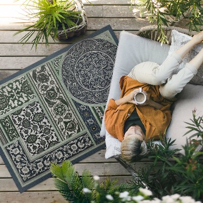 Buiten tapijt Het ornamentale ontwerp van Albert Racinet