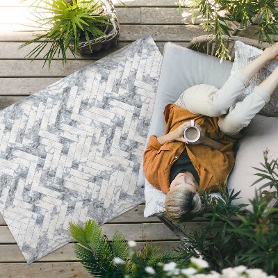 Buiten tapijt Licht visgraat parket