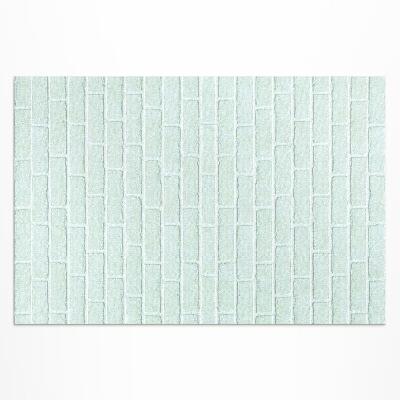 Buiten tapijt Een bakstenen muur in een blauwgroene kleur