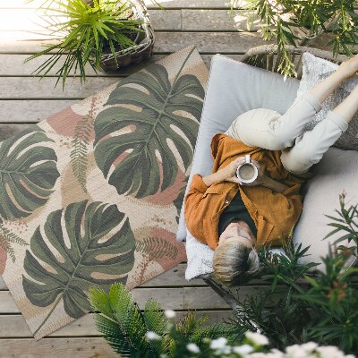 Buitenkleed Een compositie van vintage monsterabladeren en varens