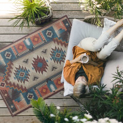 Buiten tapijt Symmetrische composities in de Azteekse geest