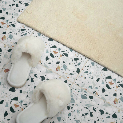 Pvc tegels Een gespikkeld steenpatroon in een elegante stijl