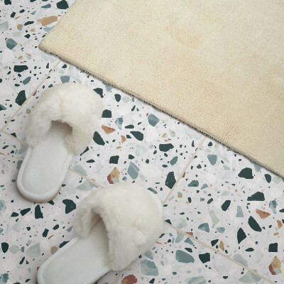 Pvc tegels Een gespikkeld steenpatroon in een elegante stijl