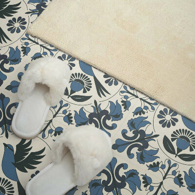 Pvc tegels Een afbeelding van een vogel omringd door bloemen