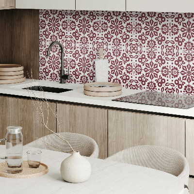 Zelfklevende vinyltegels Een patroon van bloemen vergezeld van bladeren