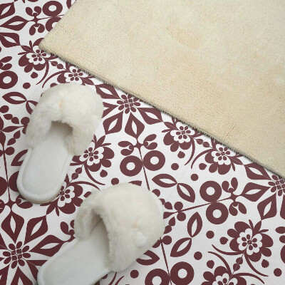 Zelfklevende vinyltegels Een patroon van bloemen vergezeld van bladeren