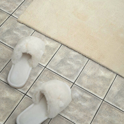 Zelfklevende vinyltegels Een motief dat keramische tegels imiteert